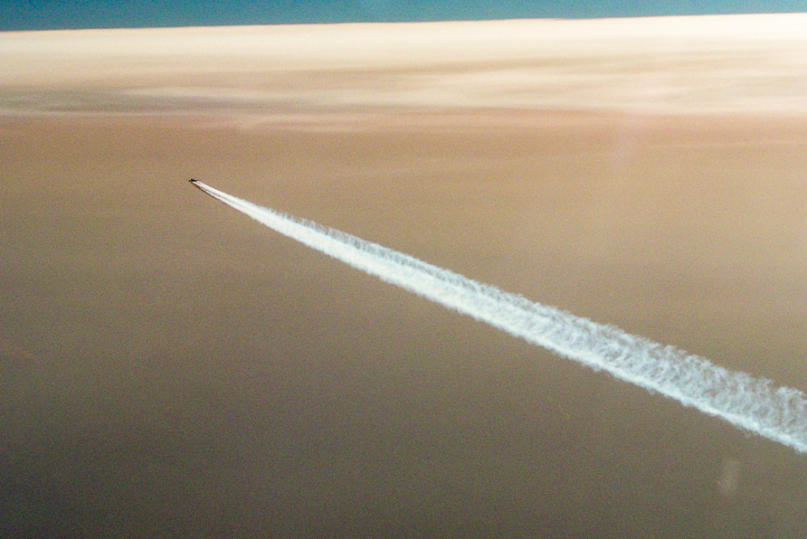 Following an airliner at cruise altitude.